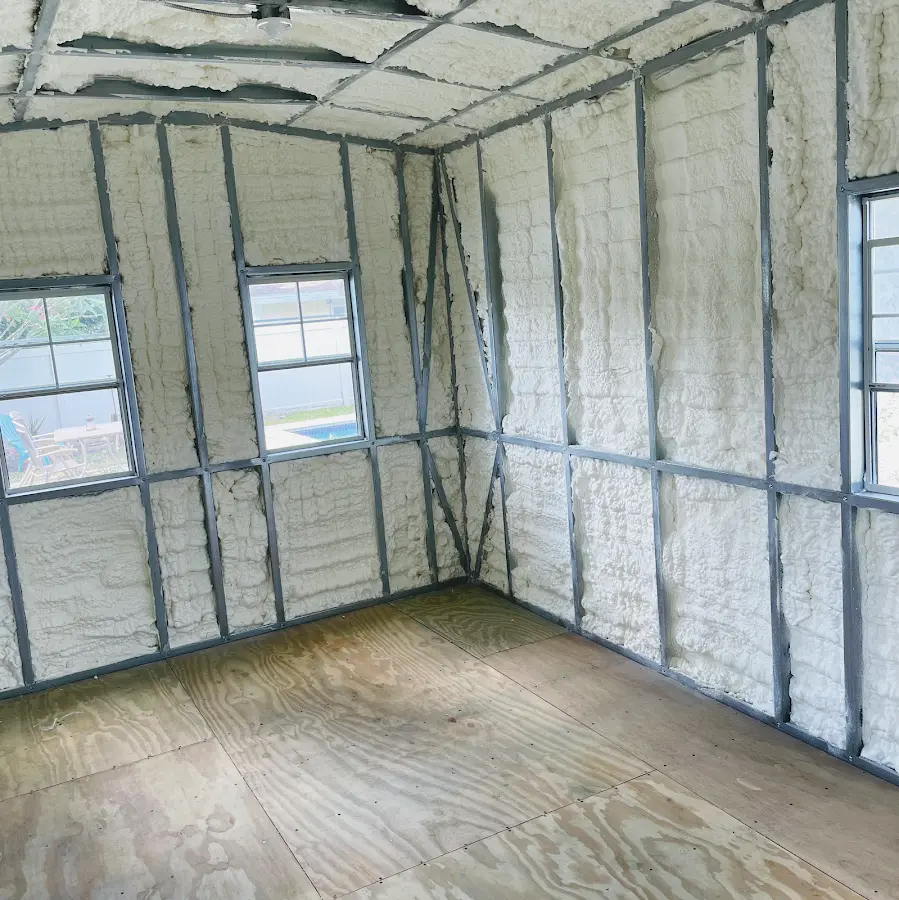 Closed-cell spray foam insulation applied to wall cavities in a residential project in Howard